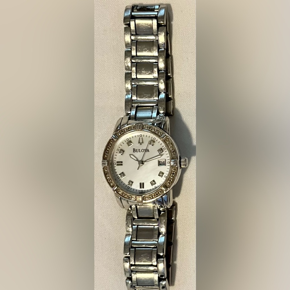 Like new Bulova C637530 Ladies Quartz Watch Diamond Bezel.